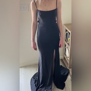 Black fitted prom dress with slit
